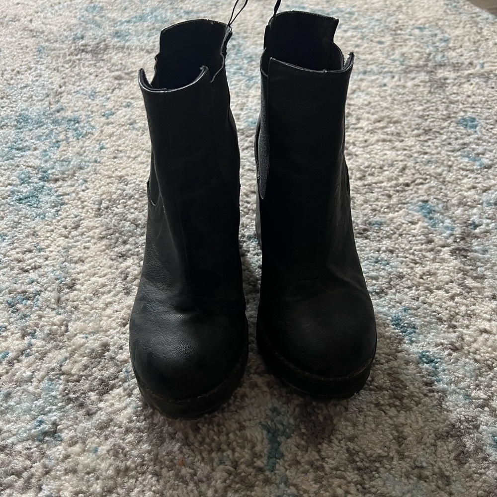 Black leather heeled booties